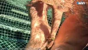 Real passionate sex underwater of a couple in love on vacation, risky outdoors